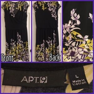 Black dress with floral accents. Cross over top.